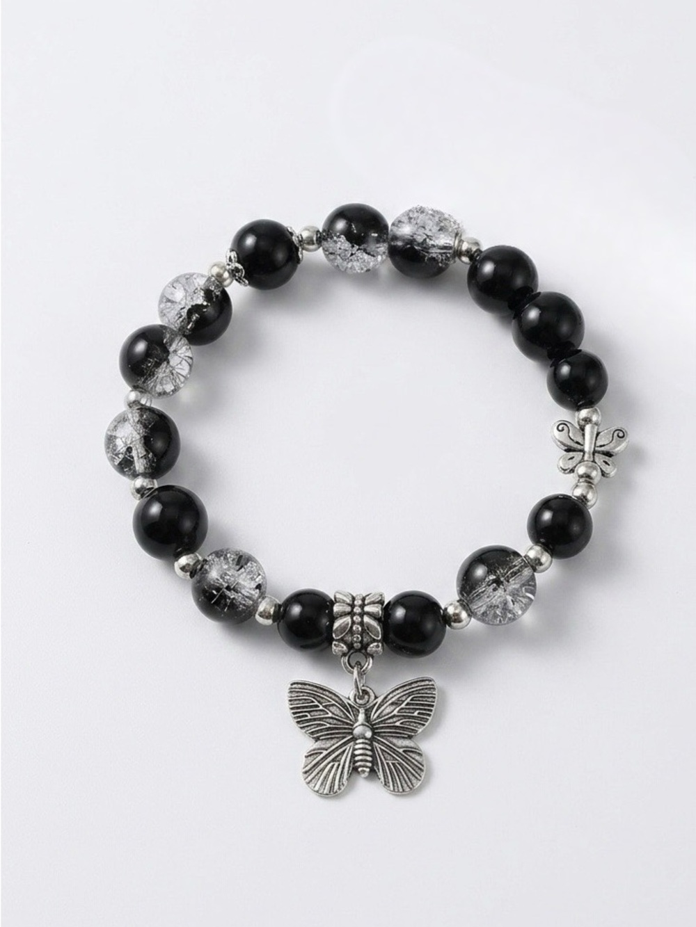 Hand Crafted Black and Clear Beaded Bracelet with Butterfly Charm